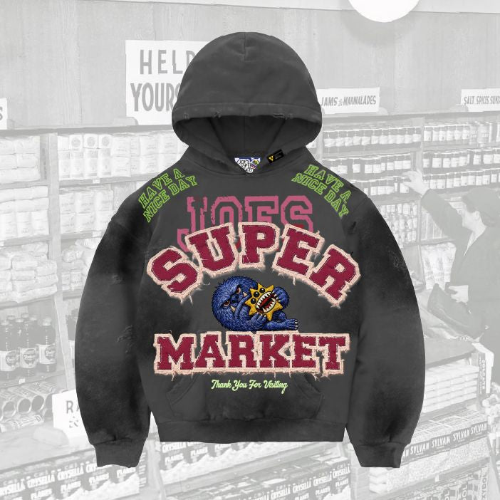 JOES SUPERMARKET Pigment-wash effect monster appliqué pullover hoodie - Black