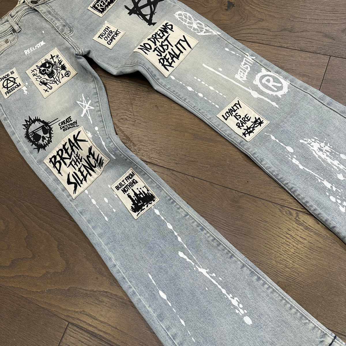 Reelistik BREAK THE SILENCE STACKED SLIM FIT PATCHED STRETCH Jeans - Light Blue Wash